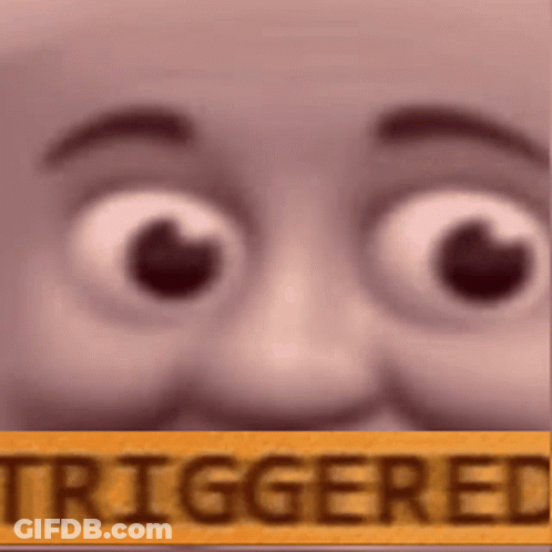 A Close Up Of A Person 'S Face With A Sign That Says `` Triggered '' . GIF