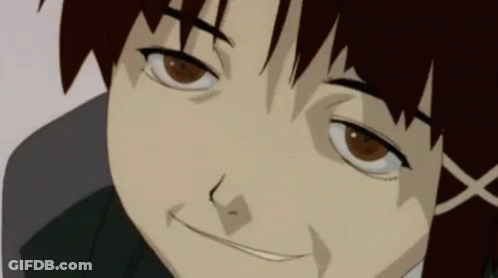 A Close Up Of A Person 'S Face With A Slight Smile On Their Face GIF