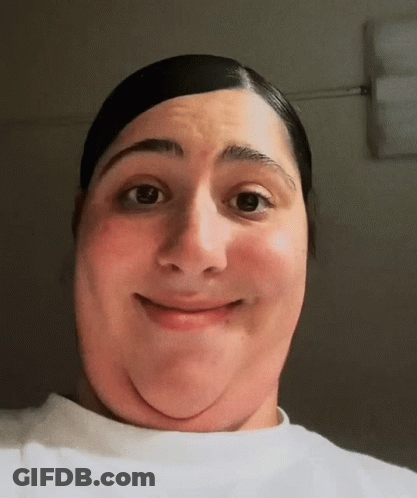 A Close Up Of A Person 'S Face With A Smile On It GIF