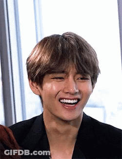 A Close Up Of A Person 'S Face With A Smile On It GIF