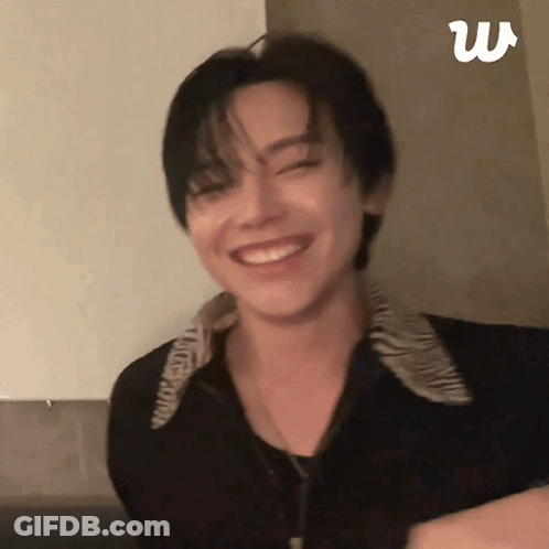 A Close Up Of A Person 'S Face With A Smile On It . GIF