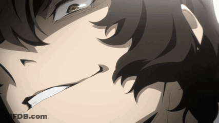 A Close Up Of A Person 'S Face With A Smirk On Their Face GIF