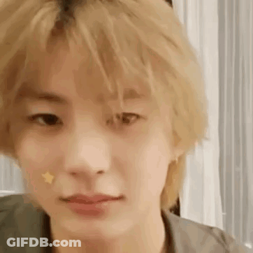 Close Up Of Person's Face With Star GIF