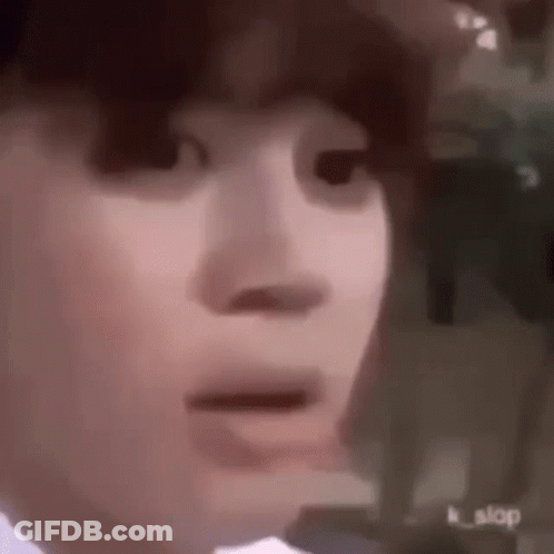 A Close Up Of A Person 'S Face With A Surprised Look On His Face . GIF