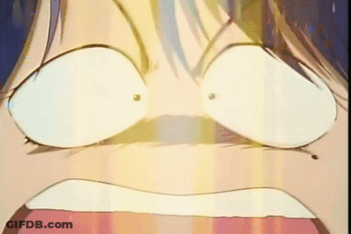 A Close Up Of A Person 'S Face With A Surprised Look On It GIF