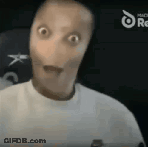 A Close Up Of A Person 'S Face With A Surprised Look On It . GIF