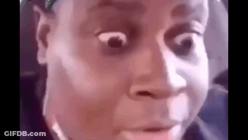 A Close Up Of A Person 'S Face With A Surprised Look On It . GIF