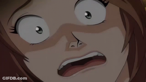 A Close Up Of A Person 'S Face With A Surprised Look On Their Face GIF