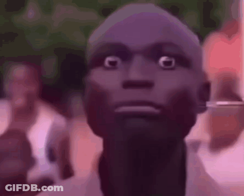 A Close Up Of A Person 'S Face With A Surprised Look On Their Face . GIF