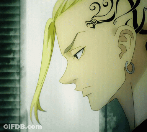 A Close Up Of A Person 'S Face With A Tattoo On Their Forehead GIF