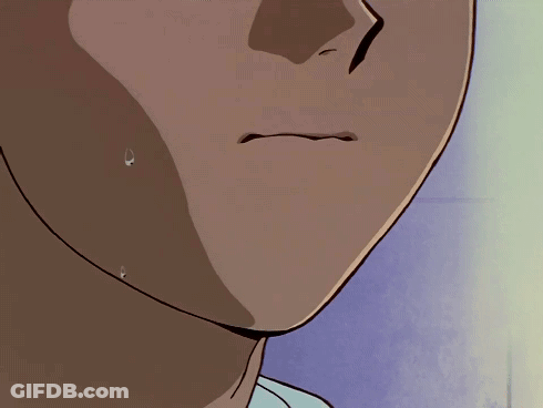 A Close Up Of A Person 'S Face With A Tear Coming Out Of His Mouth GIF