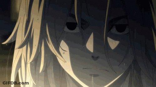 A Close Up Of A Person 'S Face With A Tear Coming Out Of Their Mouth GIF