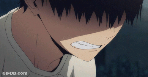 A Close Up Of A Person 'S Face With A Very Angry Expression GIF