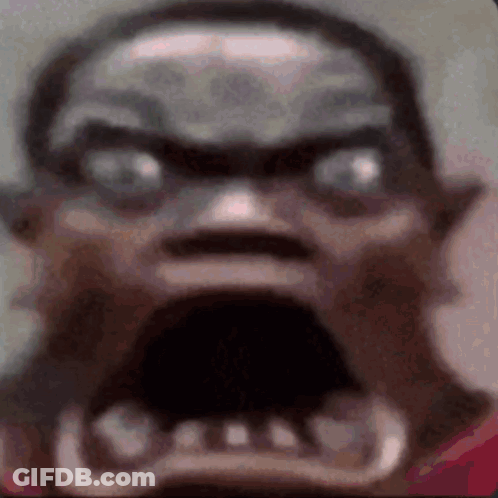 A Close Up Of A Person 'S Face With A Very Angry Look On It . GIF
