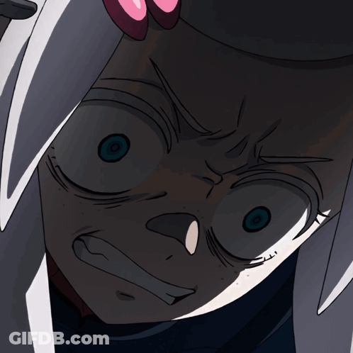 A Close Up Of A Person 'S Face With A Very Angry Look On Their Face GIF