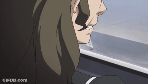 A Close Up Of A Person 'S Face With A White Circle In The Middle Of His Mouth GIF