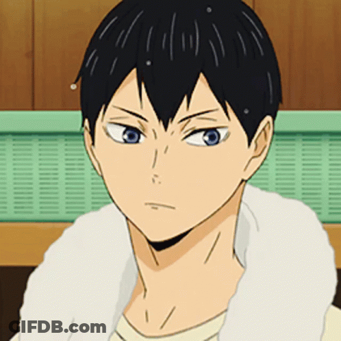 A Close Up Of A Person 'S Face With A White Towel Around Their Neck . GIF