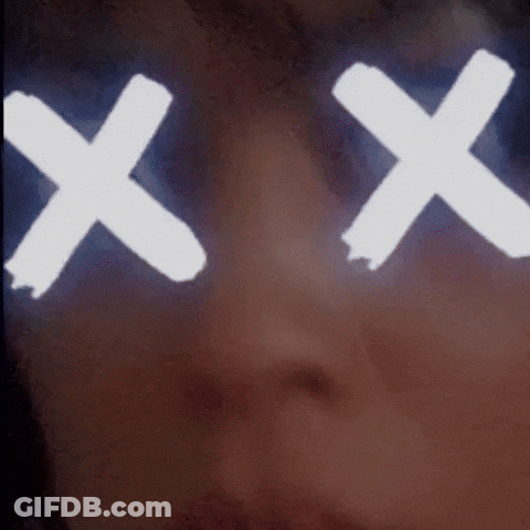 A Close Up Of A Person 'S Face With A White X On Their Eyes GIF