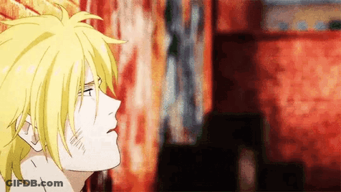 A Close Up Of A Person 'S Face With A Yellow Haired Anime Character . GIF