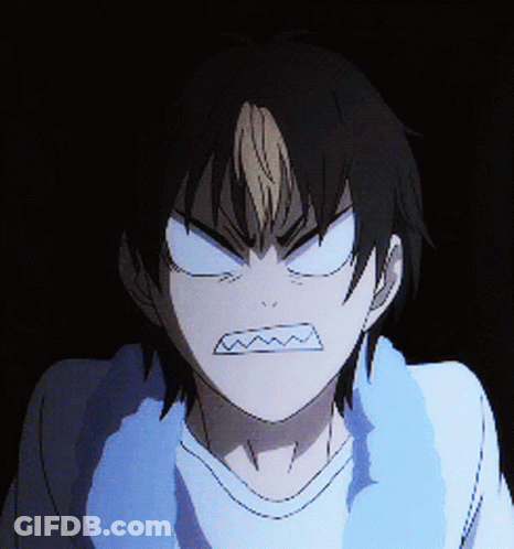 A Close Up Of A Person 'S Face With An Angry Look On Their Face GIF