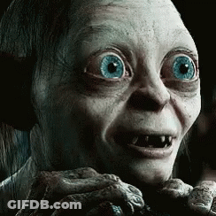 A Close Up Of A Person 'S Face With Big Blue Eyes GIF