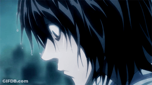 A Close Up Of A Person 'S Face With Black Hair GIF