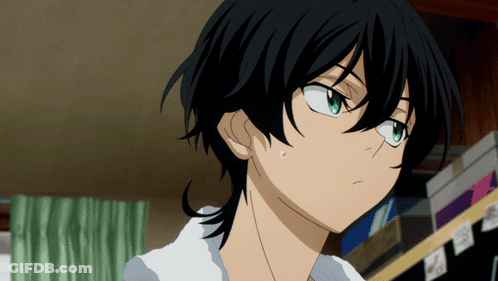 A Close Up Of A Person 'S Face With Black Hair GIF