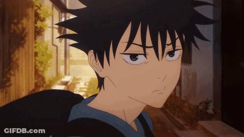 A Close Up Of A Person 'S Face With Black Hair GIF