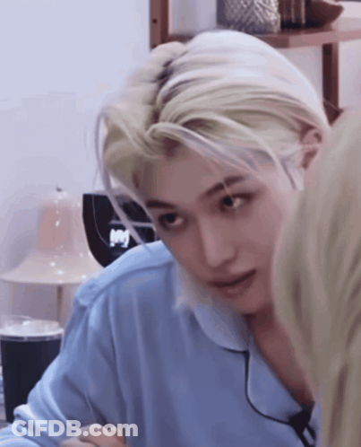 A Close Up Of A Person 'S Face With Blonde Hair GIF