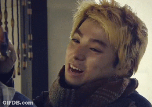 A Close Up Of A Person 'S Face With Blonde Hair GIF