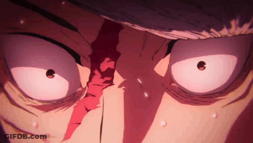 A Close Up Of A Person 'S Face With Blood Coming Out Of His Eyes . GIF