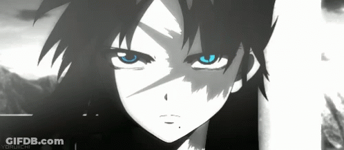 A Close Up Of A Person 'S Face With Blue Eyes And Black Hair . GIF