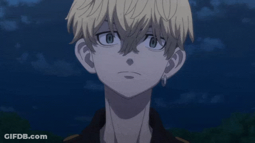 A Close Up Of A Person 'S Face With Blue Eyes GIF