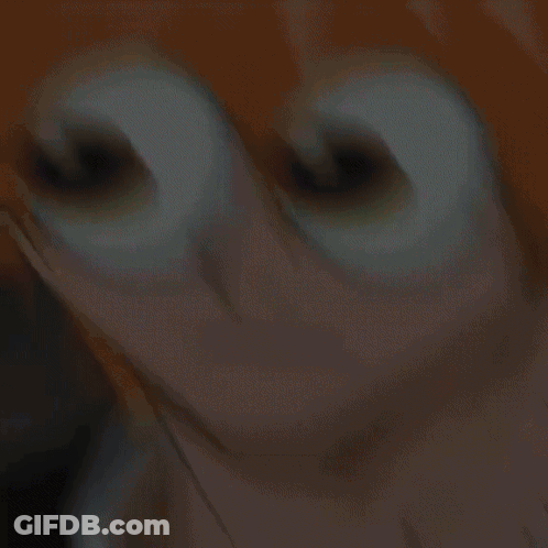 A Close Up Of A Person 'S Face With Cartoon Eyes GIF