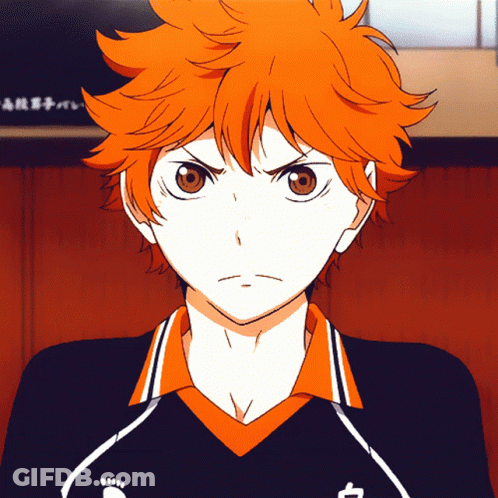 A Close Up Of A Person 'S Face With Chinese Writing On The Wall In The Background GIF