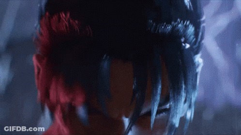 A Close Up Of A Person 'S Face With Dark Hair GIF