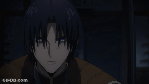 A Close Up Of A Person 'S Face With Dark Hair And Blue Eyes GIF