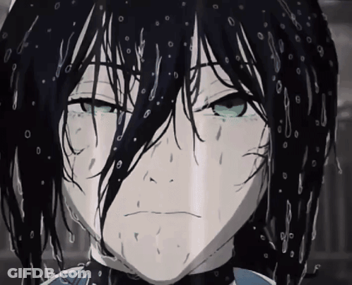A Close Up Of A Person 'S Face With Drops Of Water On It GIF