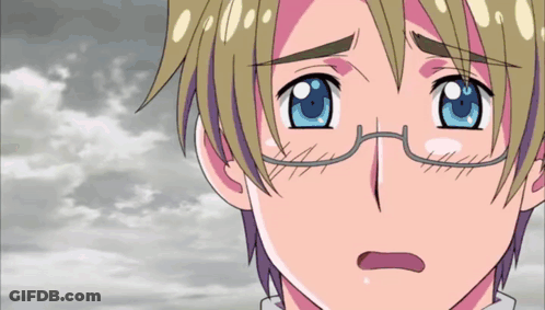 A Close Up Of A Person 'S Face With Glasses And Blue Eyes GIF