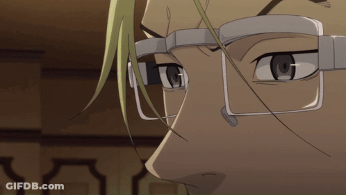 A Close Up Of A Person 'S Face With Glasses And Green Hair GIF