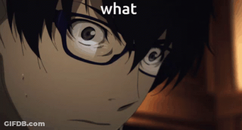 A Close Up Of A Person 'S Face With Glasses And The Word What Above Them GIF