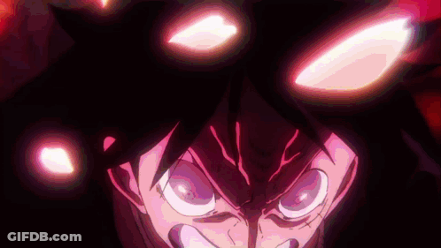 A Close Up Of A Person 'S Face With Glowing Eyes In The Dark . GIF