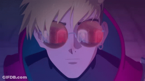 A Close Up Of A Person 'S Face With Glowing Glasses On GIF
