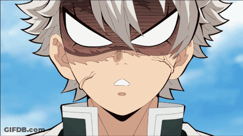 A Close Up Of A Person 'S Face With Gray Hair GIF