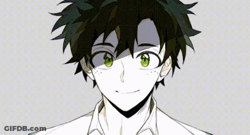 A Close Up Of A Person 'S Face With Green Eyes GIF