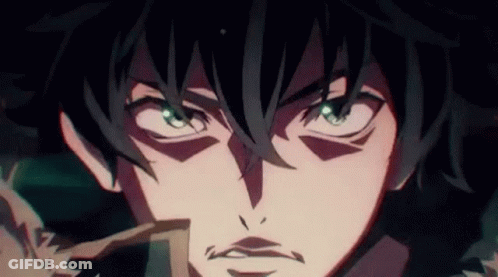 A Close Up Of A Person 'S Face With Green Eyes And A Beard . GIF