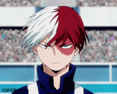 A Close Up Of A Person 'S Face With Half Red And Half White Hair GIF
