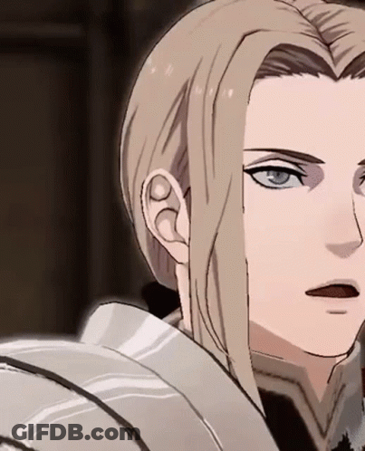 A Close Up Of A Person 'S Face With Long Blonde Hair And Blue Eyes . GIF