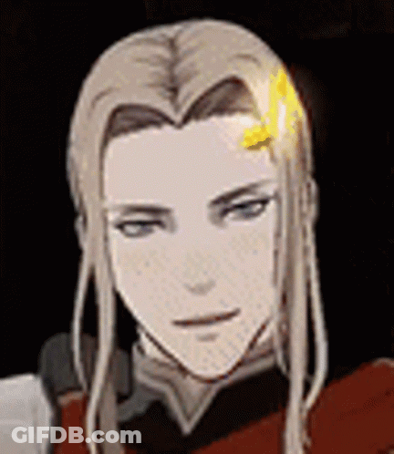 A Close Up Of A Person 'S Face With Long Hair And A Yellow Flower In Their Hair . GIF