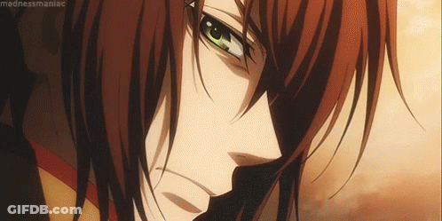 A Close Up Of A Person 'S Face With Long Red Hair . GIF